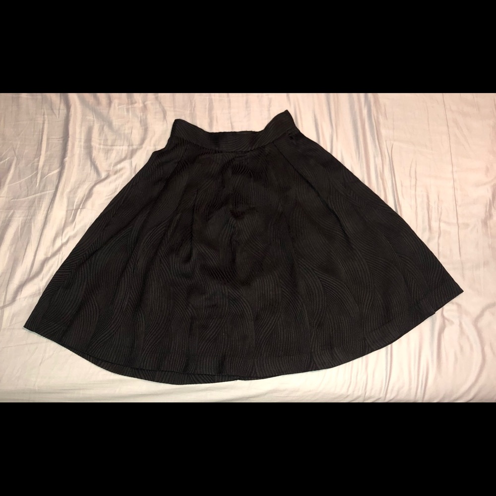 Black pleated midi skirt